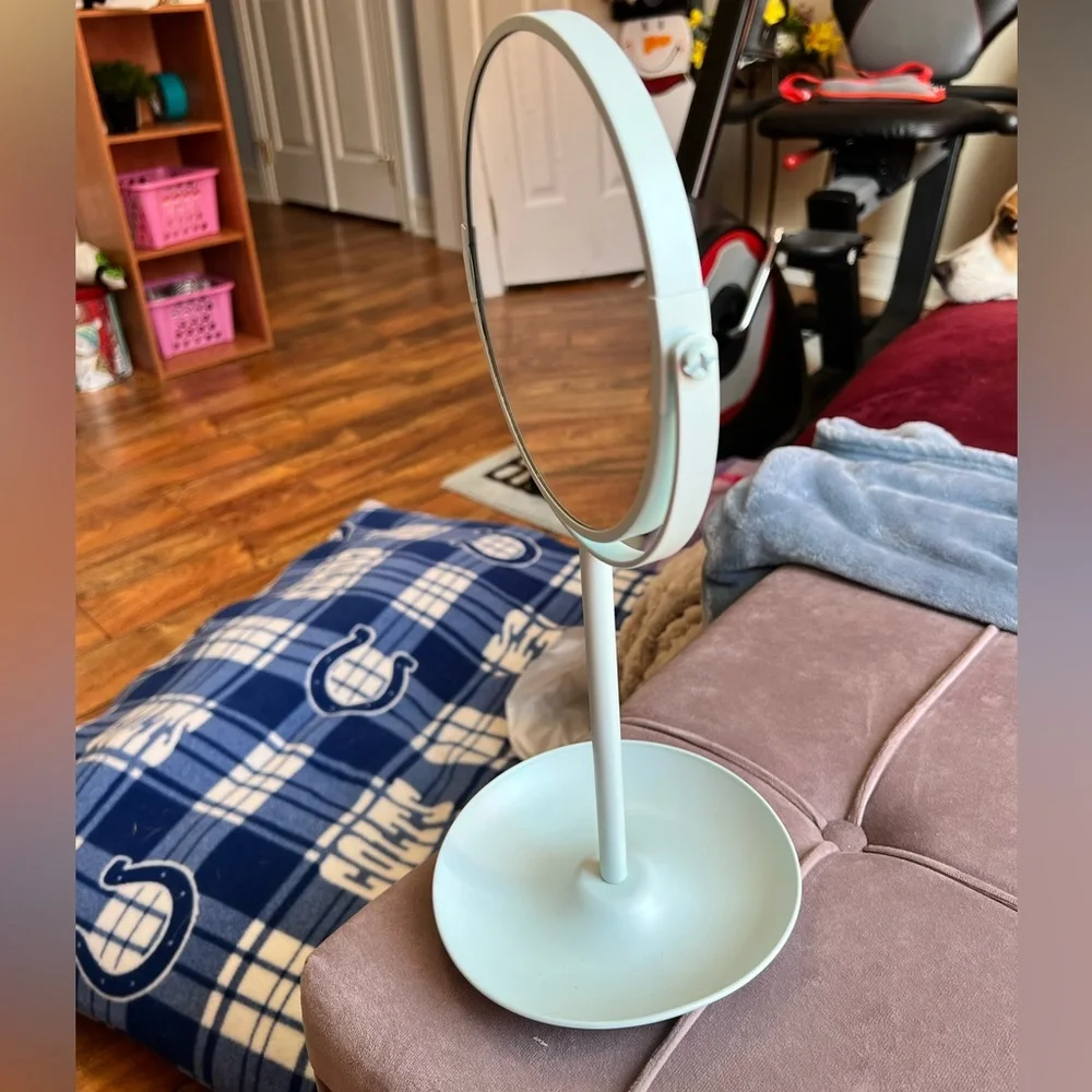 Light teal makeup mirror with handy tray to hold little items